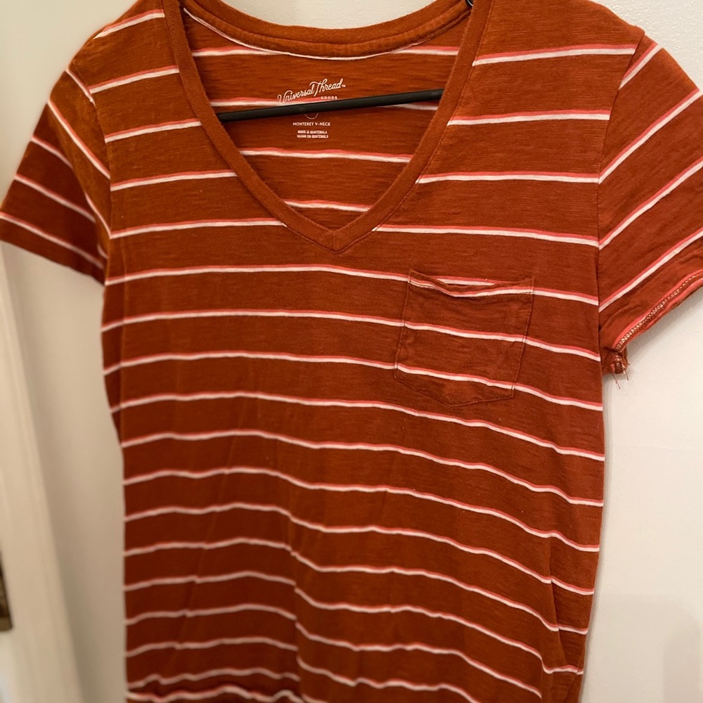 Orange and whitenstriped T-shirt